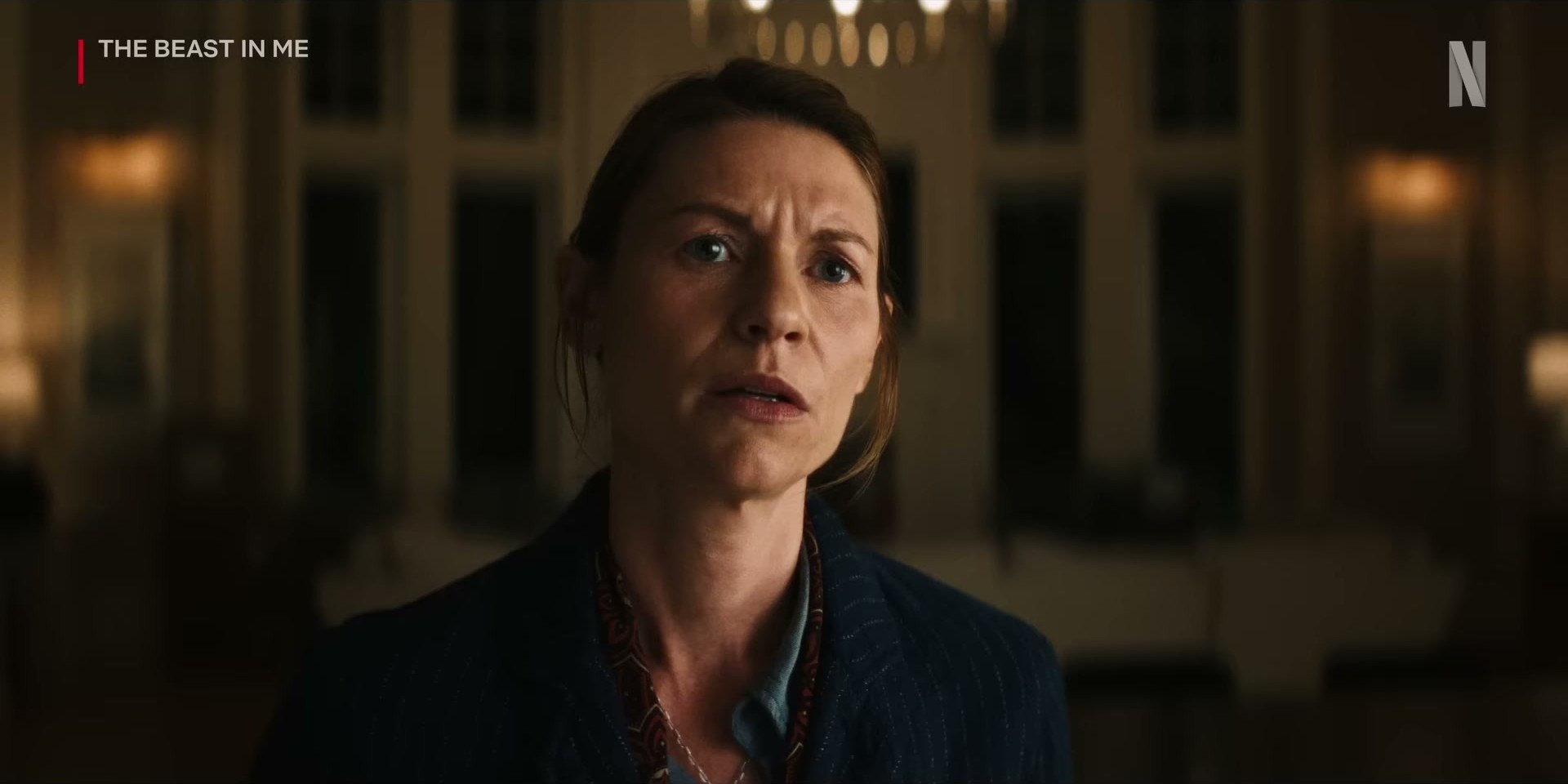 Claire Danes in The Beast in Me on Netflix — navy blazer over a paisley blouse? yes please