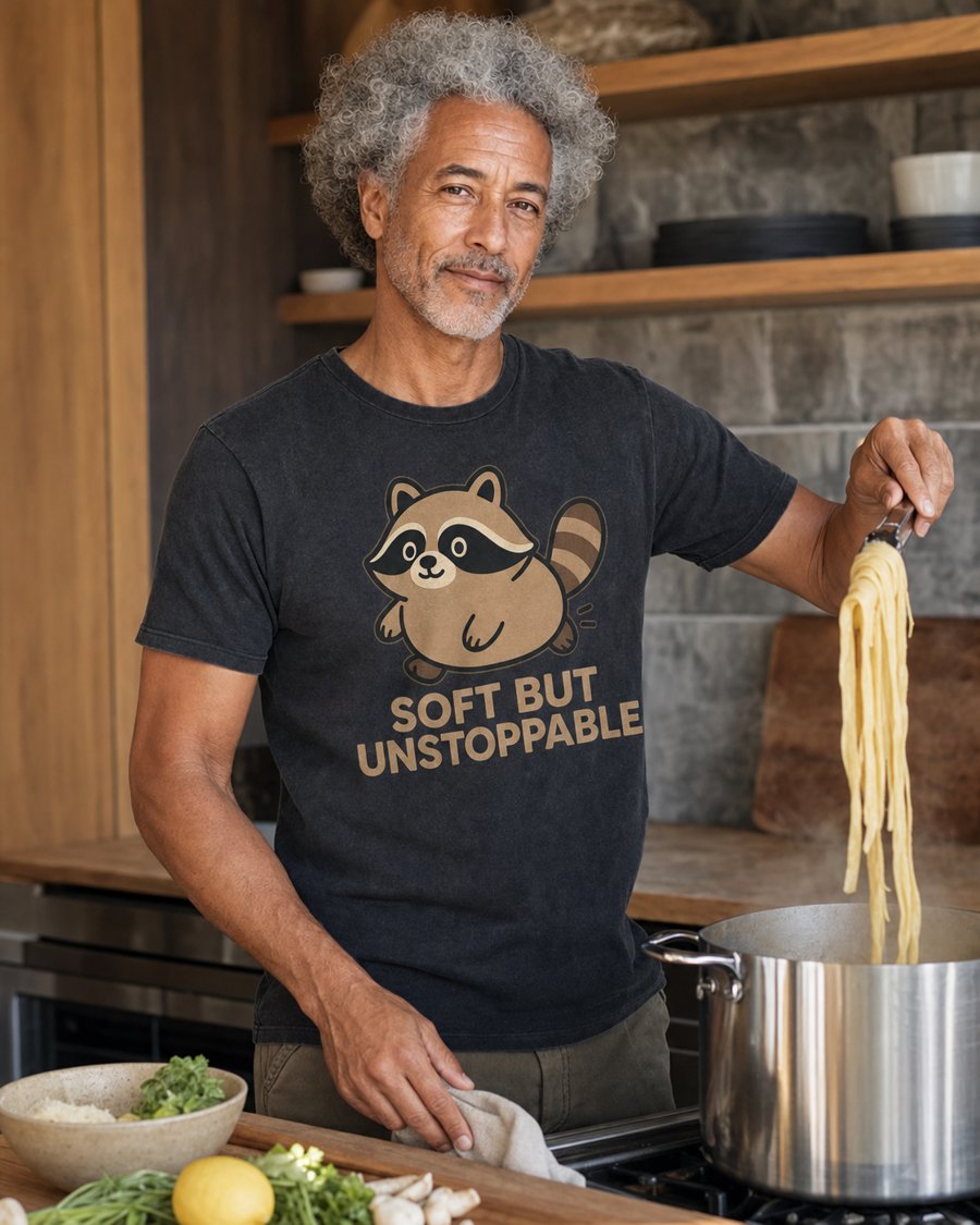 Jimothy's "SOFT BUT UNSTOPPABLE" tee basically gives you superpowers in the kitchen.