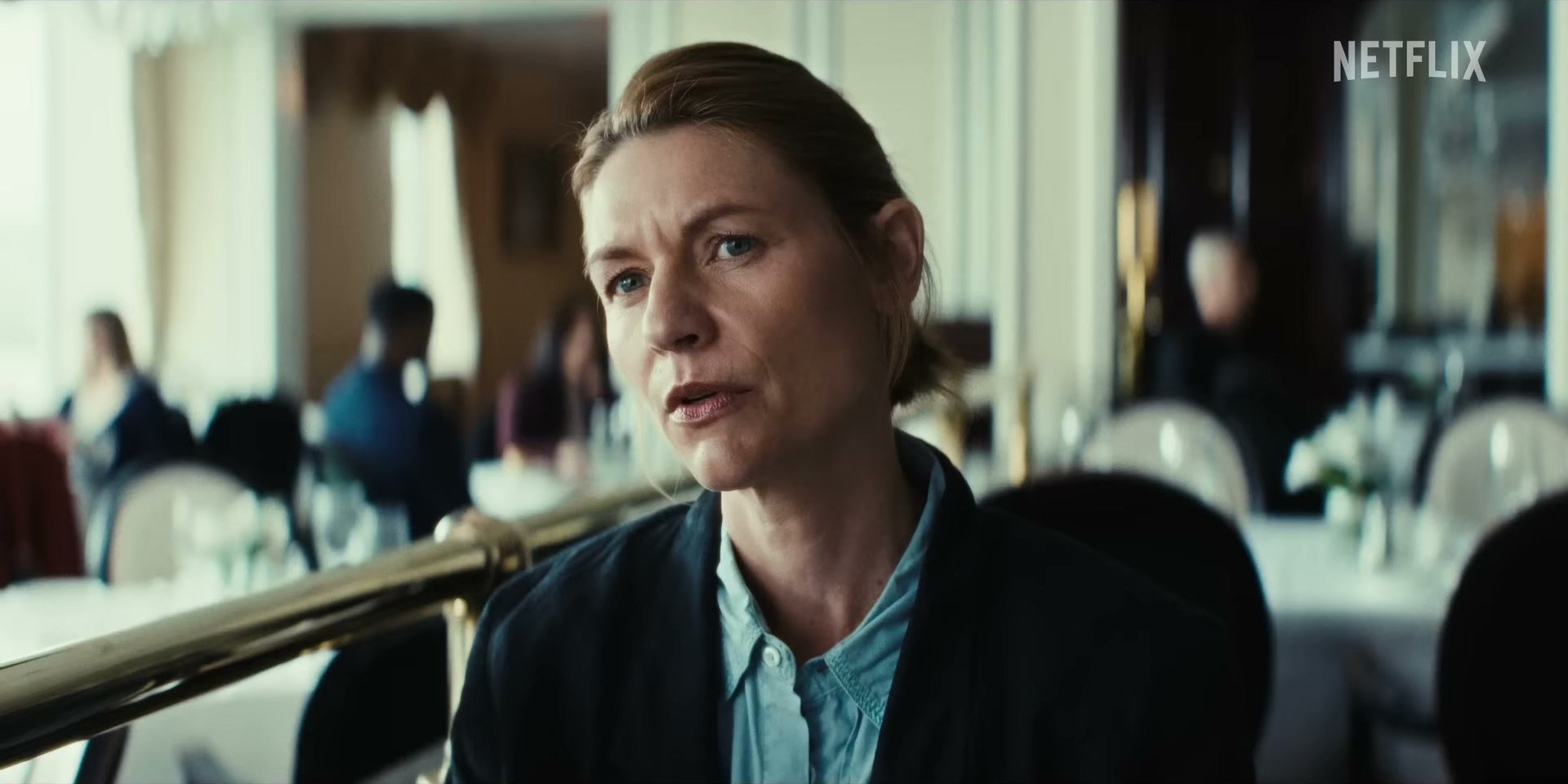 Claire Danes in The Beast in Me on Netflix — navy blazer with a pop of blue