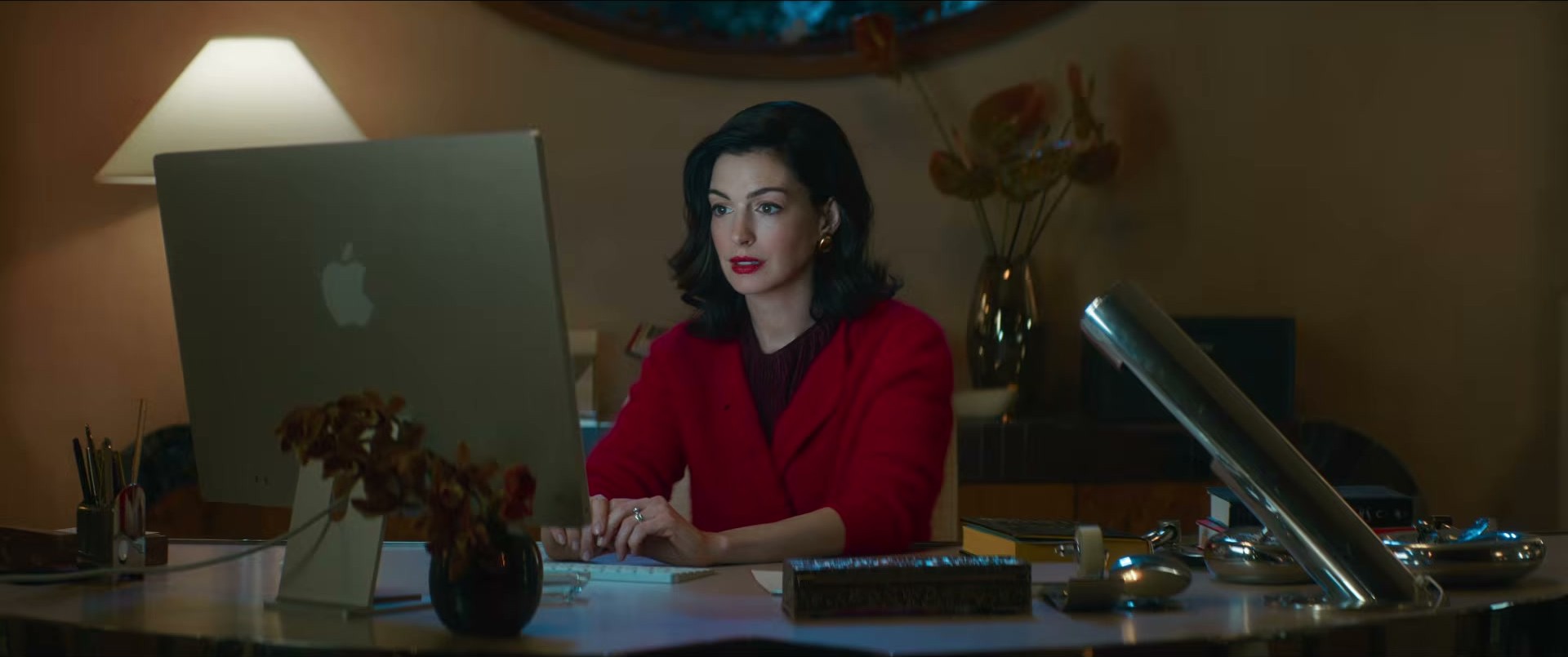 Anne Hathaway in Verity — red blazer is the main character