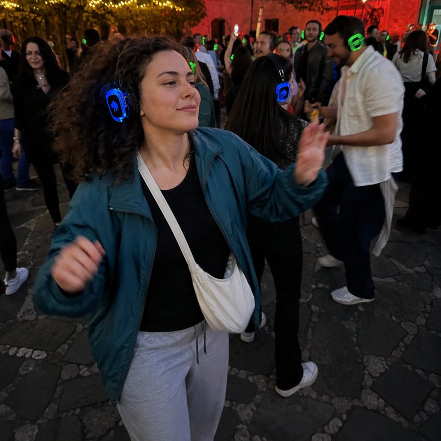The glowing headphones are doing all the heavy lifting.