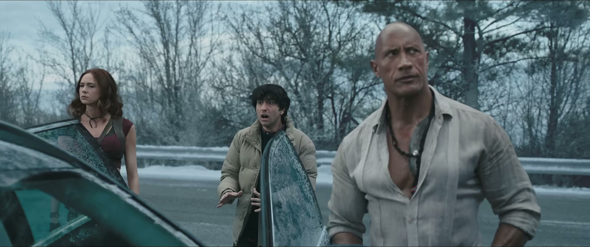 from the Jumanji Open World trailer — the unbuttoned linen is doing all the work