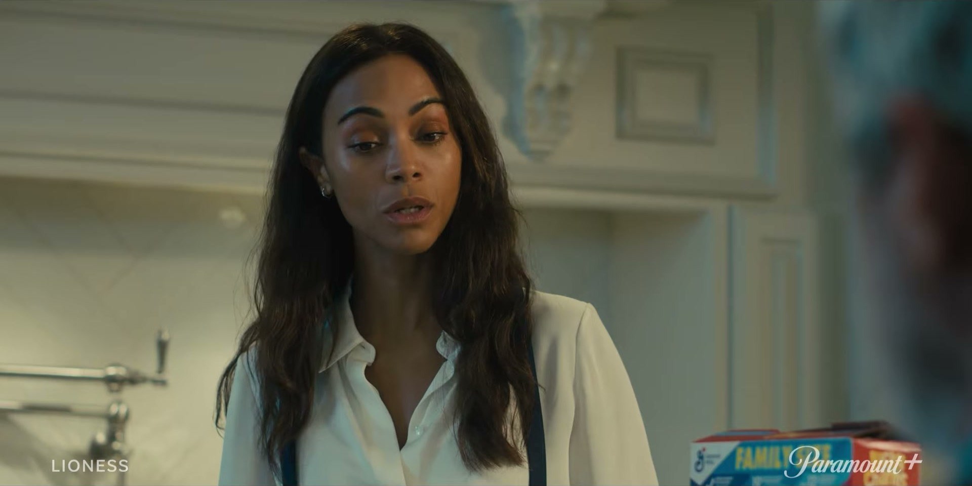 Zoe Saldaña in Lioness on Paramount+ — the white button down doing all the heavy lifting