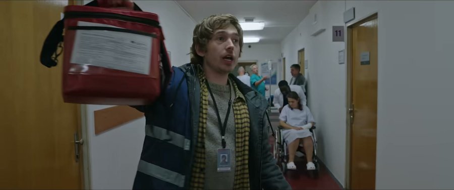 Austin Abrams in Resident Evil — hi-vis vest with layers for days