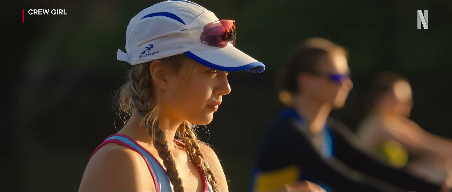 Miku Martineau in Crew Girl on Netflix — her cap alone does half the work
