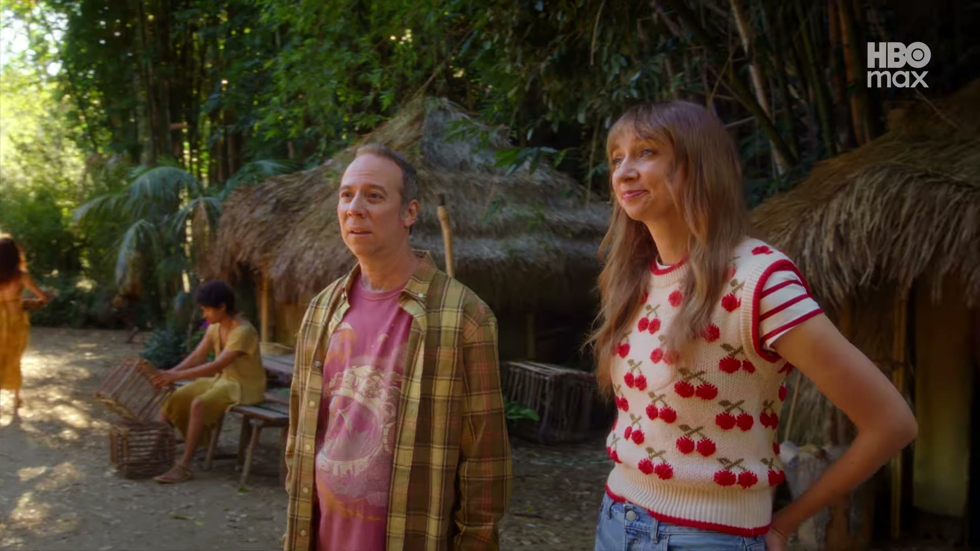 Lauren Lapkus in Stuart Fails to Save the Universe on HBO Max — that cherry sweater is doing all the work