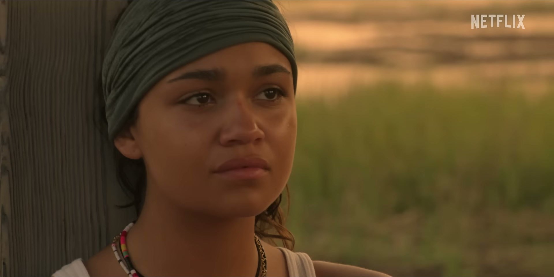 Madison Bailey in Outer Banks — headwraps make everything look better