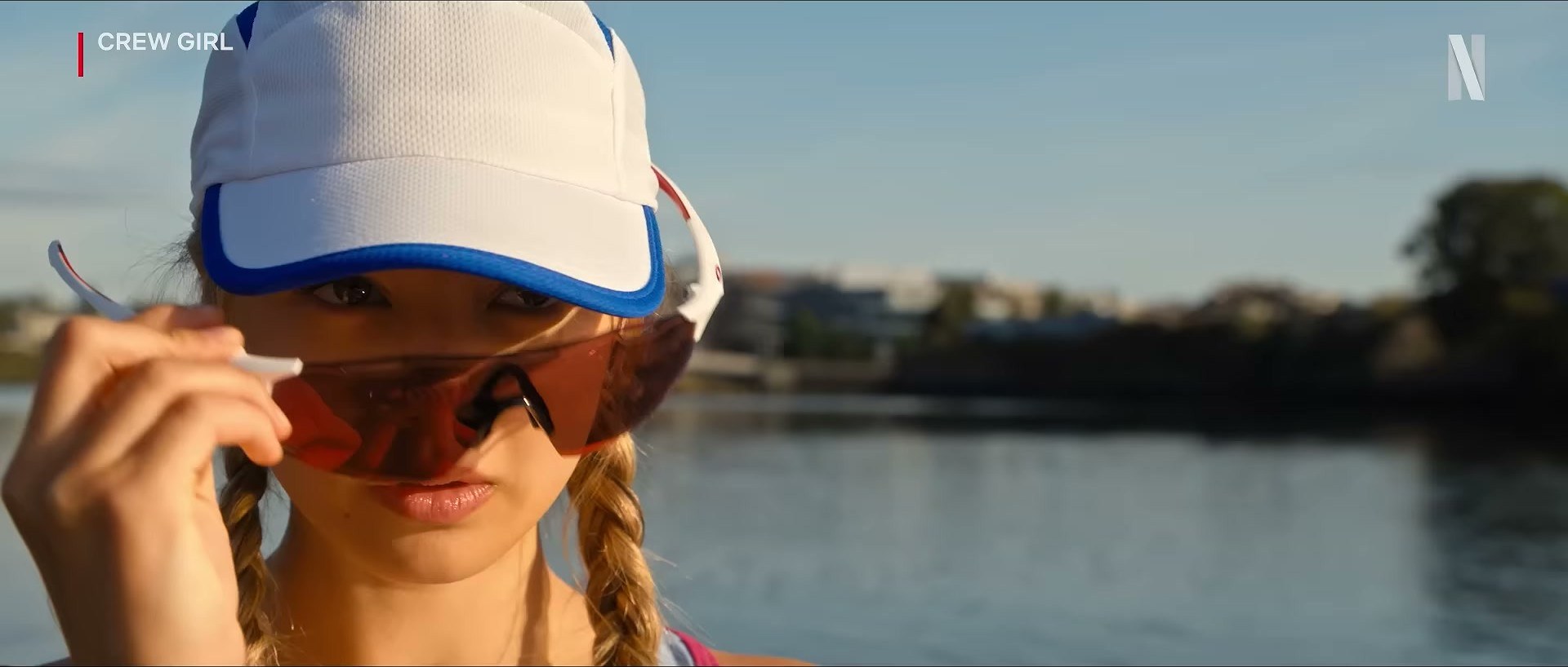 Miku Martineau in Crew Girl on Netflix — that cap with the blue trim is doing so much work