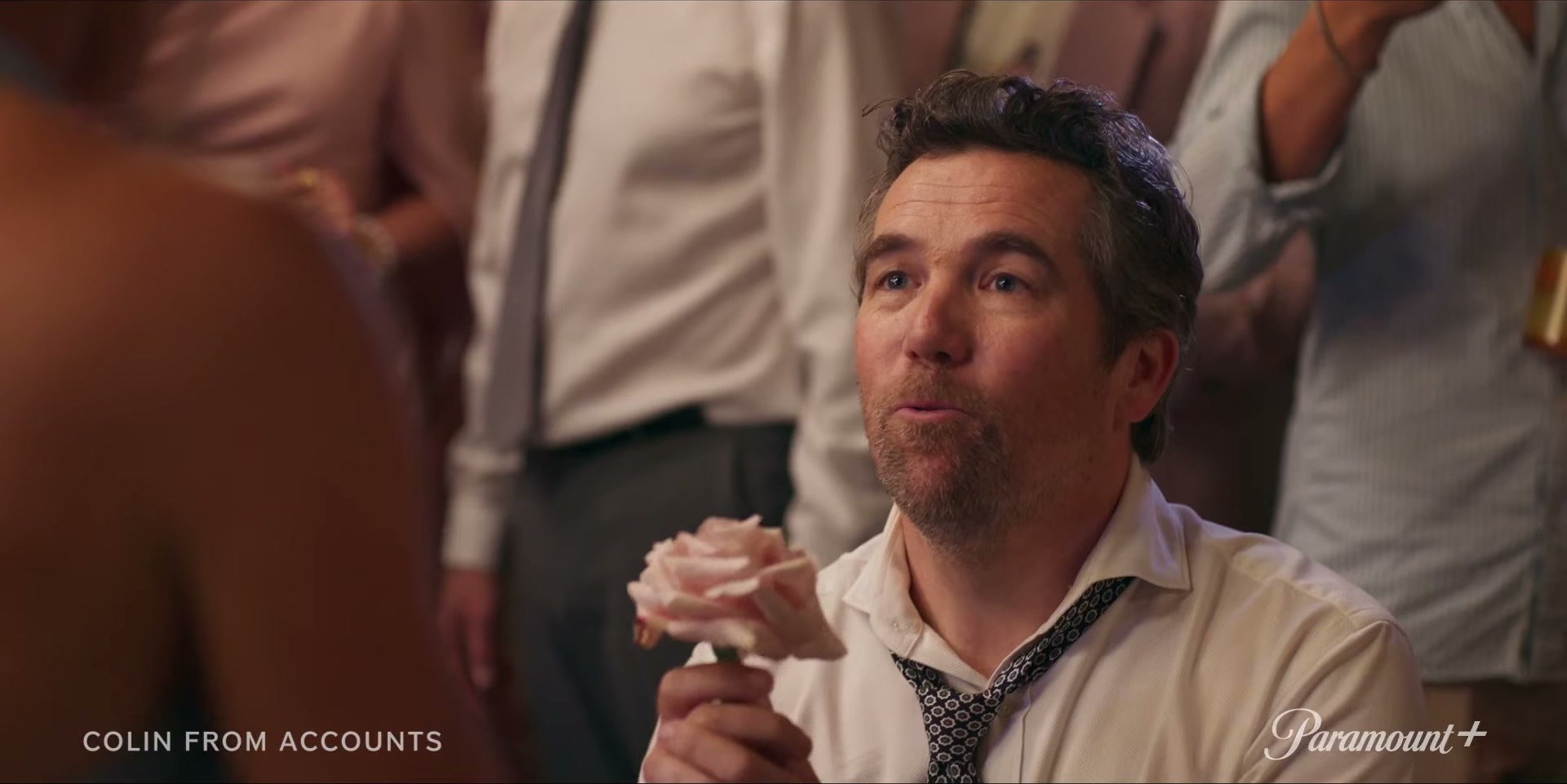Patrick Brammall in Colin From Accounts on Paramount+ — loose tie energy is doing so much here